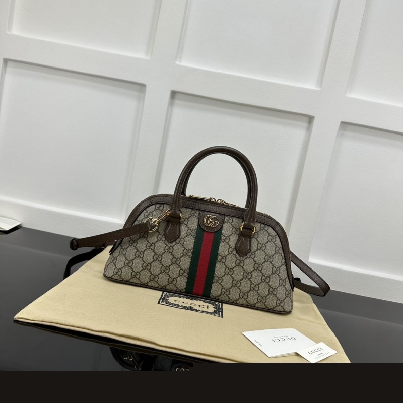 G*u*i top handle bags